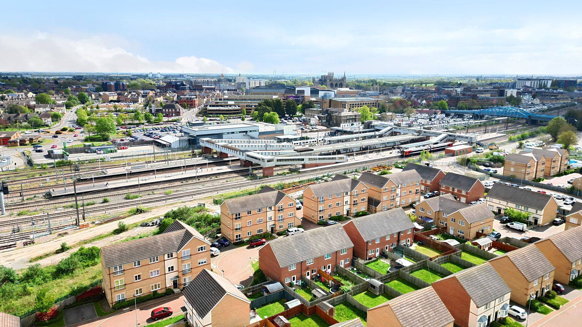 Rathbone Crescent from the air, with Peterborough station, the city centre and the Cathedral beyond